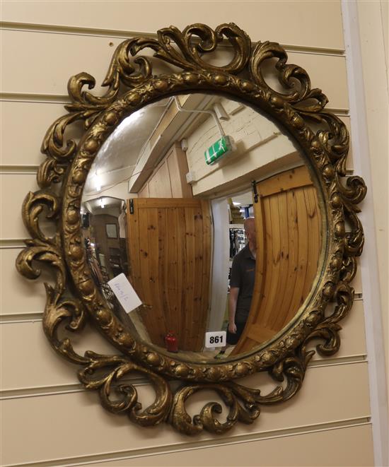 A gilt frame convex wall mirror W.56cm